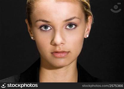 Portrait of a young woman looking serious