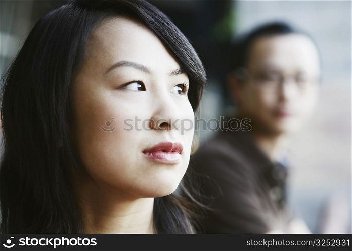 Portrait of a young woman looking sideways