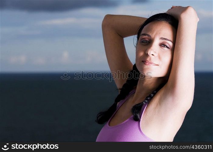 Portrait of a young woman meditating