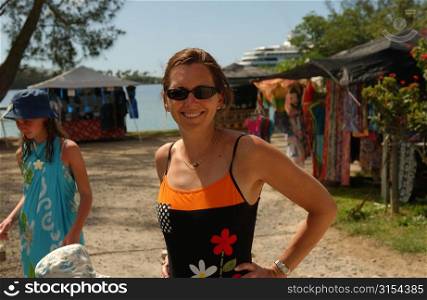 Portrait of a young woman on a beach, Moorea, Tahiti, French Polynesia, South Pacific