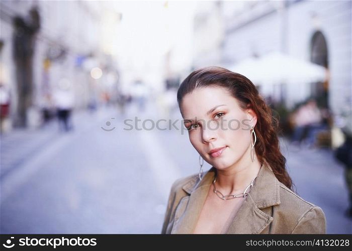 Portrait of a young woman on the street