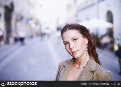 Portrait of a young woman on the street