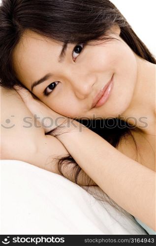 Portrait of a young woman resting and smiling