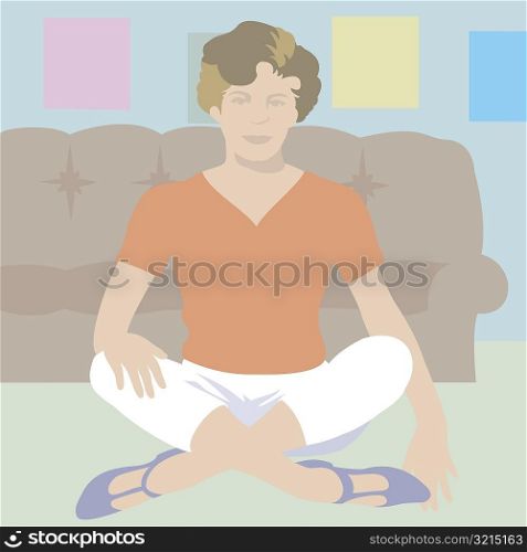 Portrait of a young woman sitting cross legged