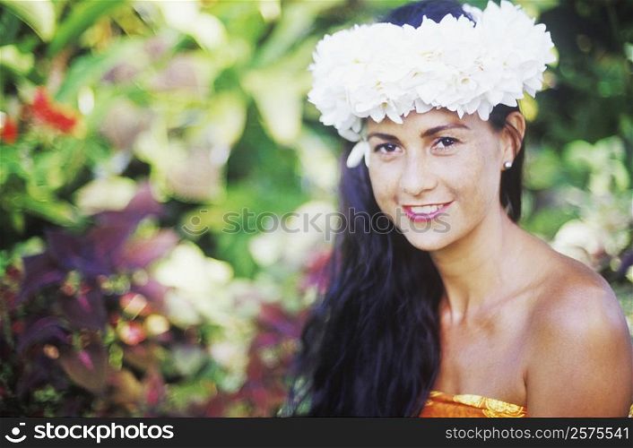 Portrait of a young woman smiling, Hawaii, USA