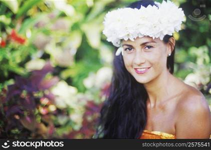 Portrait of a young woman smiling, Hawaii, USA