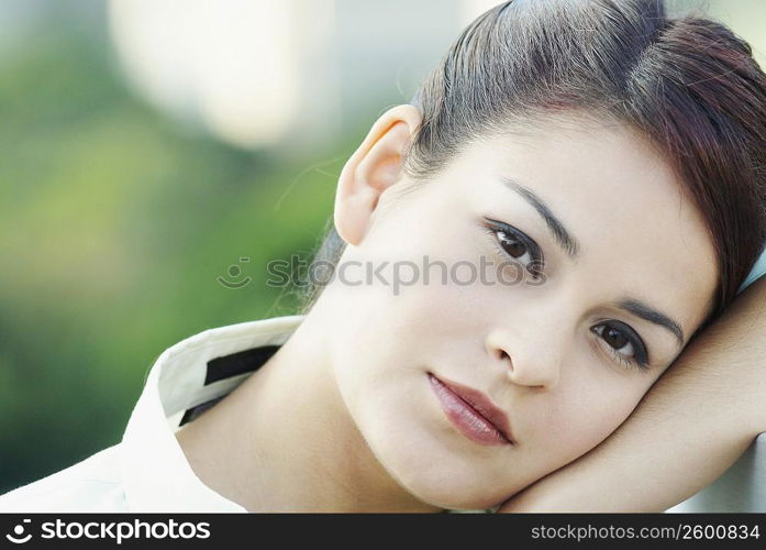 Portrait of a young woman thinking