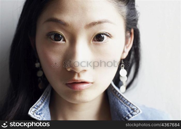 Portrait of a young woman thinking