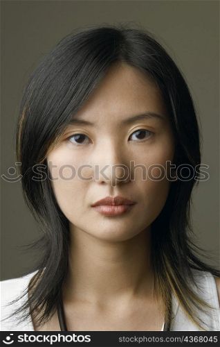 Portrait of a young woman thinking