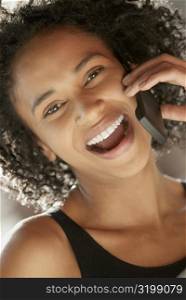 Portrait of a young woman using a mobile phone