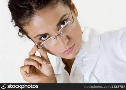 Portrait of a young woman wearing eyeglasses