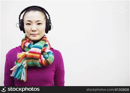 Portrait of a young woman wearing headphones