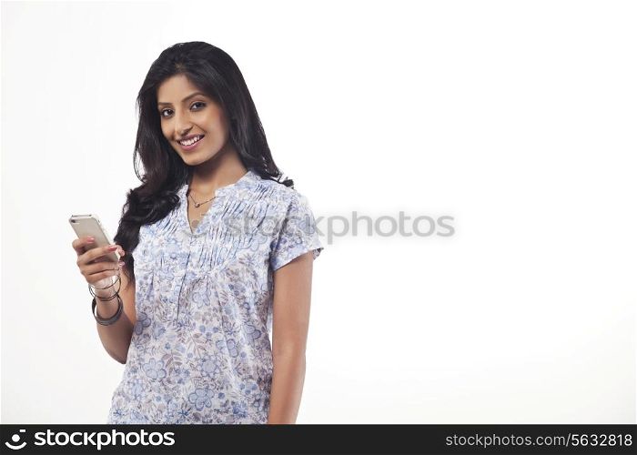 Portrait of a young woman with a mobile phone