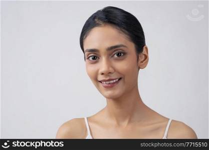 Portrait of a young woman with clear,spotless skin.