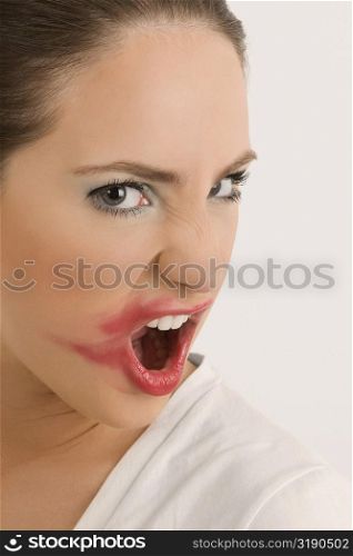 Portrait of a young woman with her messy lips