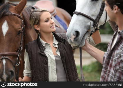 portrait of a young woman with horses