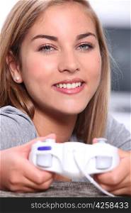 portrait of a young woman with video game