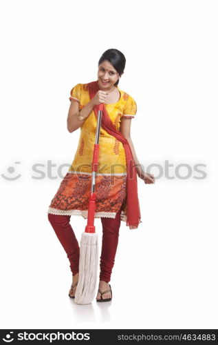 Portrait of a young WOMEN holding a mop