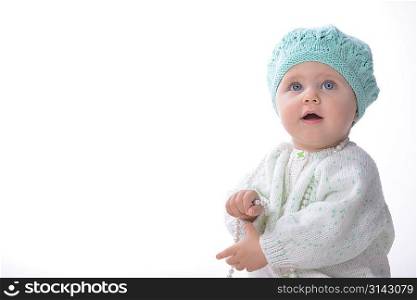 Portrait of adorable baby girl with pearl necklace