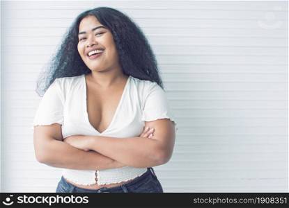 Portrait of african black woman posing and standing with confidence with white background and copy space