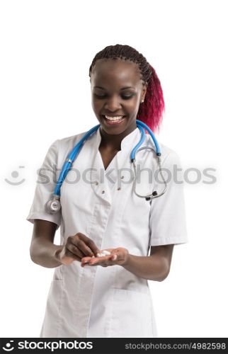 Portrait of african female doctor with pills