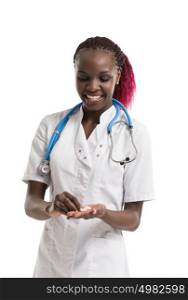 Portrait of african female doctor with pills