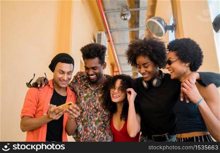 Portrait of Afro friends having fun in the city and spending good time together. Friendship and lifestyle concept.