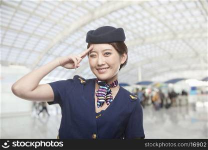 Portrait of Air Stewardess Winking