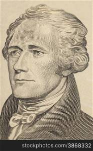 Portrait of Alexander Hamilton in front of the ten dollar bill