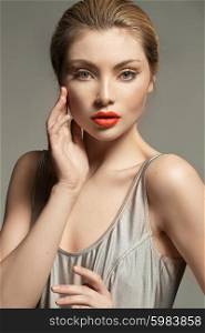 Portrait of an adorable young woman with beautiful red lips