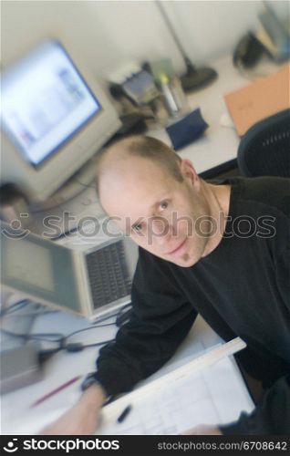 Portrait of an architect sitting in an office