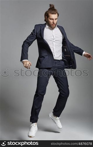 Portrait of an attractive man wearing sports suit