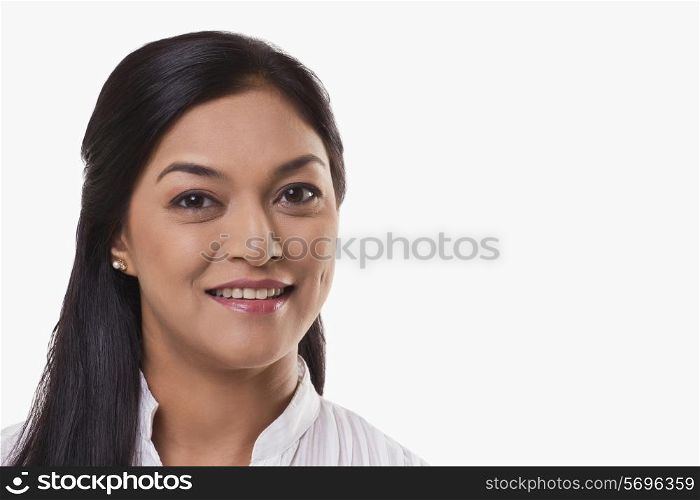 Portrait of an attractive mid adult woman over white background