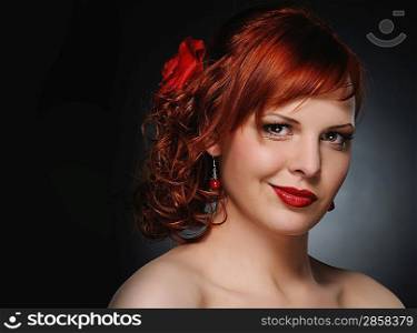 Portrait of an attractive redhead woman