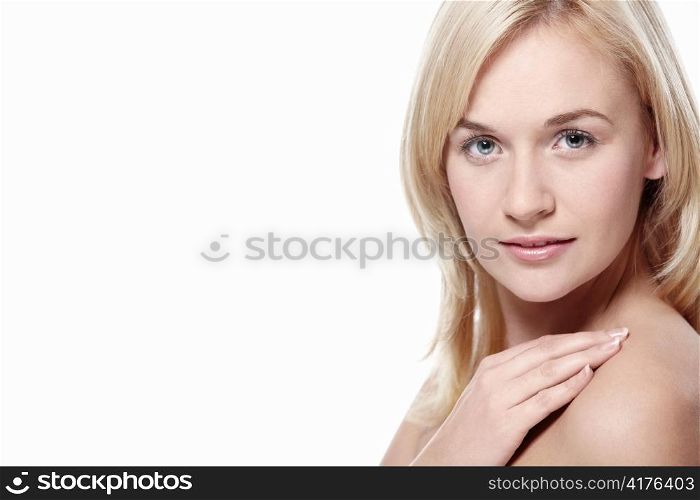Portrait of an attractive woman on a white background