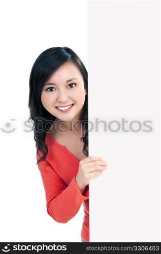 Portrait of an attractive young woman holding a billboard