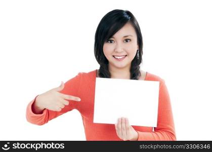 Portrait of an attractive young woman holding blank note card