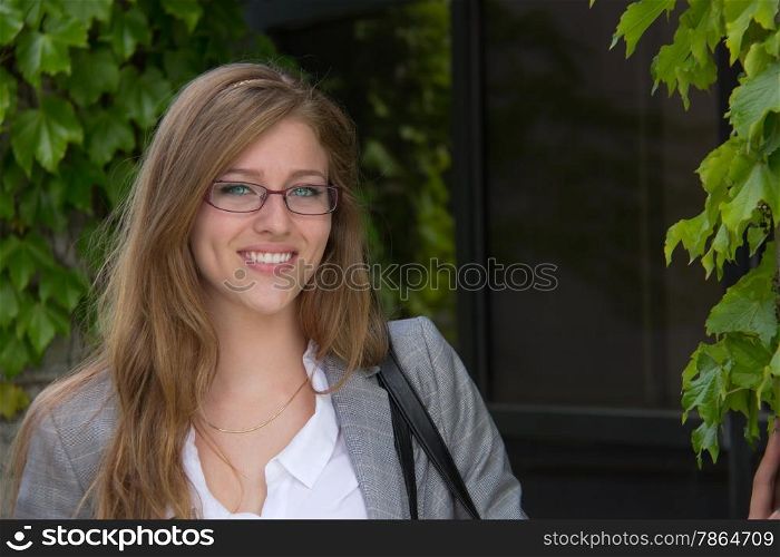 Portrait of an attractive young woman on campus