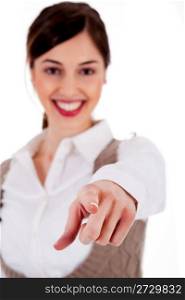Portrait of an attractive young woman pointing her finger on white background