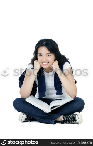 Portrait of an attractive young woman sitting on floor on white background.