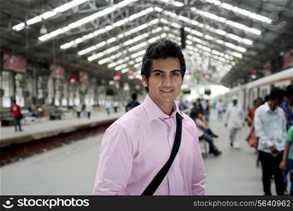 Portrait of an businessman at a train station