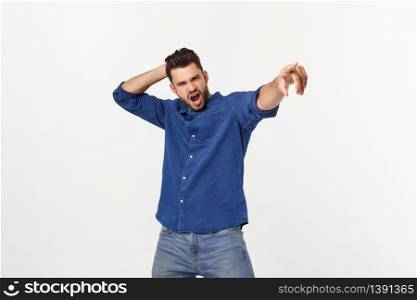 Portrait of an emotional young man dancing. Isolated over white background.. Portrait of an emotional young man dancing. Isolated over white background