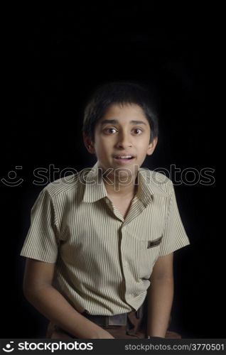 Portrait of an handsome young indian kid smiling