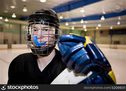 Portrait of an ice hockey player in the ice rink