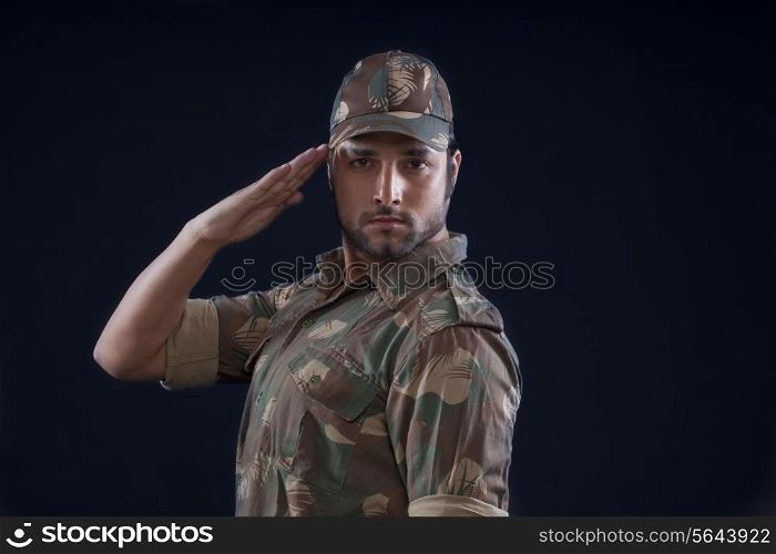 Portrait of an Indian soldier saluting