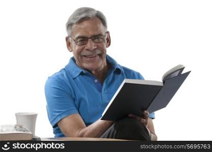 Portrait of an old man with a book