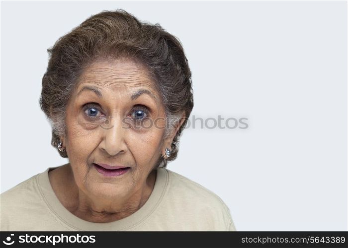 Portrait of an old woman with raised eyebrows