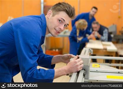 portrait of apprentice in workshop