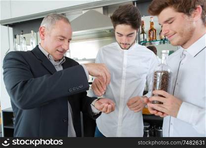 portrait of apprentices barmen with teacher