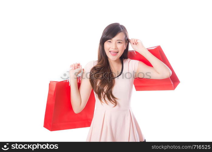 Portrait of asian beautiful young woman holding shopping bag with smile and happy, girl with buying on isolated white background, consumerism concept.